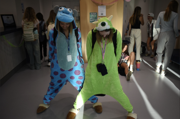 Students dressing up as Sully and Mike Wazowski for duo day!